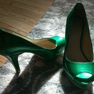 Nine West Emerald green Peep-toe platforms.